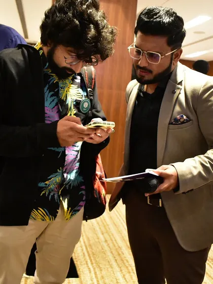Sharing a laugh with stand-up comedian Garv Malik after a corporate gig. The camaraderie between artists behind the scenes is just as important as the energy on stage.