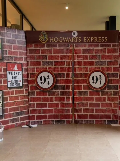 The iconic Platform 9 3/4 entrance, allowing guests to run through the brick wall and board the Hogwarts Express.