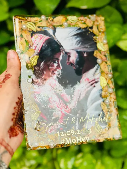 This 5x7 inch plate is a great budget-friendly option that doesn't compromise on beauty. It allows you to preserve your varmala and wedding photo in a compact and elegant keepsake.