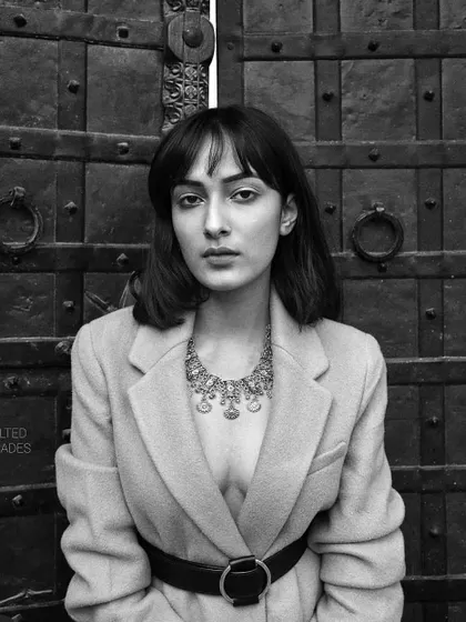 A striking black and white portrait with a modern, edgy feel. I kept the makeup minimal and clean, with a focus on perfect skin and defined brows to complement the sharp styling.