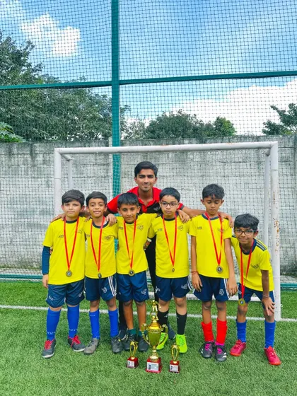 The U08 team posing with their 2nd place trophy from the Samurai Cup.