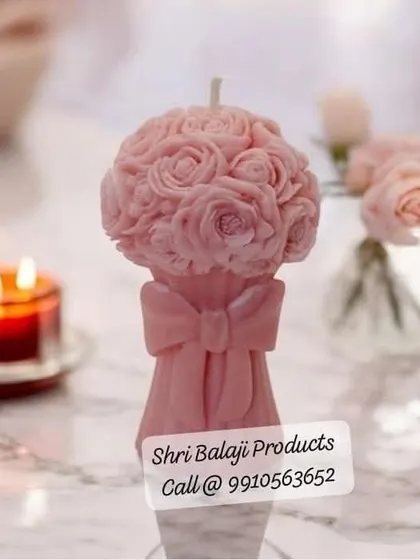 A delicate pink rose bouquet candle, shown in a soft, elegant setting. This mold is perfect for creating gifts for weddings, anniversaries, or just to show someone you care.