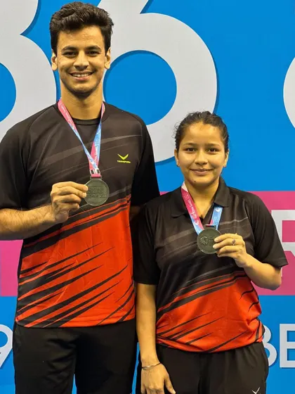 Kanika with her partner and their Silver Medals from the National Games. A fantastic achievement that shows the power of teamwork and dedication.