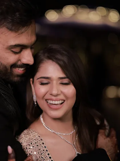 A beautiful, happy moment between the couple. Soft waves are perfect for creating these romantic, candid memories.