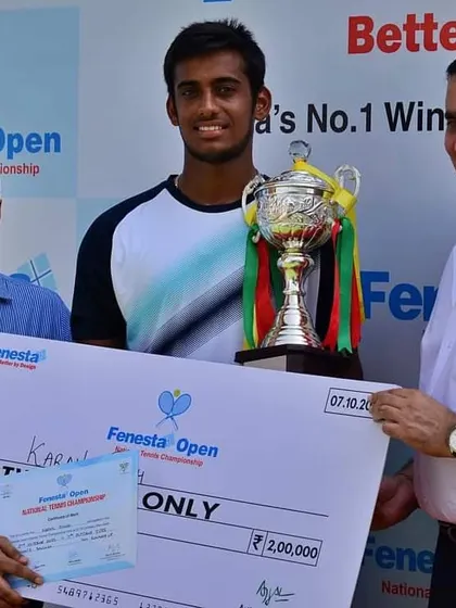 NTC's Karan Singh receiving his finalist prize money and trophy after a spectacular run in the Fenesta Nationals Men's Singles.