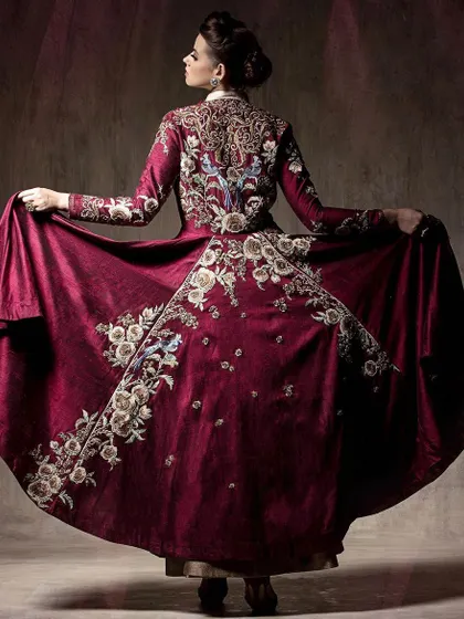 Another angle of the back, capturing the flow and spread of the embroidered jacket. This demonstrates the garment's beautiful drape and intricate craftsmanship from a different perspective.