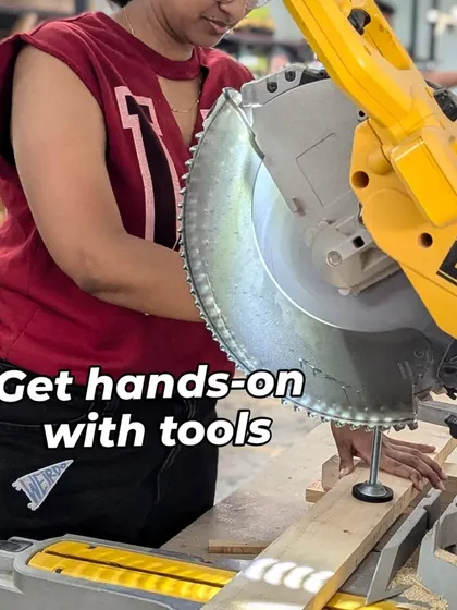 A member gets hands-on experience with a mitre saw, making a precise angled cut on a wooden plank. Our woodworking zone is perfect for everyone, whether you're a complete beginner learning the basics or an experienced crafter working on a complex build.