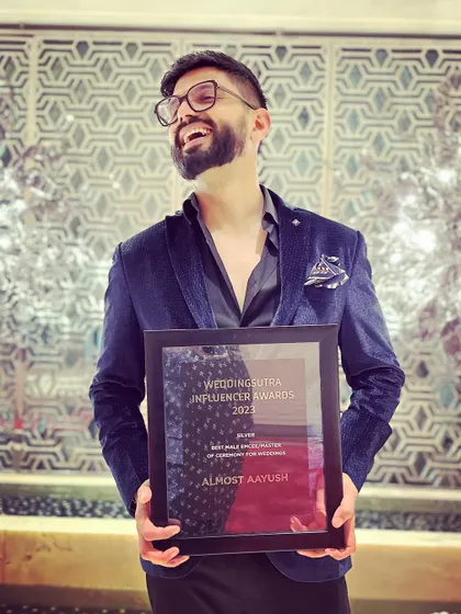 So happy and proud to hold my award for Best Male Emcee at the WeddingSutra Influencer Awards 2023. It was a fantastic night of celebration.