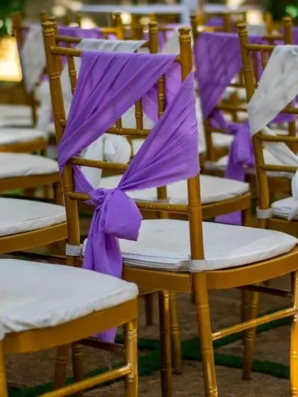 Don't forget the chairs! We provide elegant chair decorations with fabric ties that match your event's color scheme, ensuring every detail is perfect.