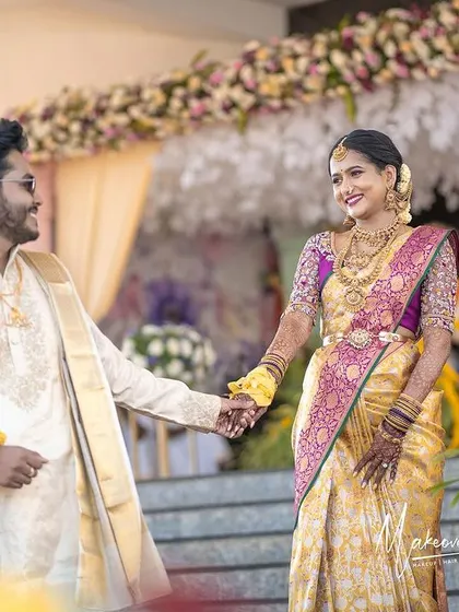 Jagruthi and her partner, a picture of happiness. We also provided the groom's makeover for a cohesive and polished look.