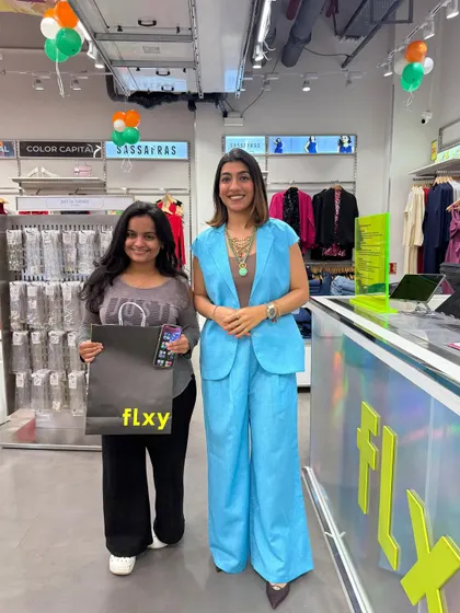 A snapshot with a customer and her new purchase. It's so rewarding to be part of someone's style transformation journey.