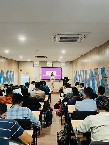 A wide shot of the classroom during my presentation. It shows the scale of these university workshops and my ability to command the attention of a large group of students.