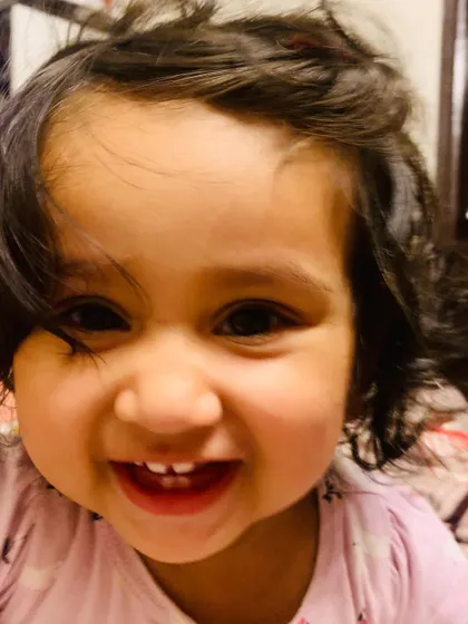 A happy smile from my little one who is about to turn one soon. Time flies so fast.