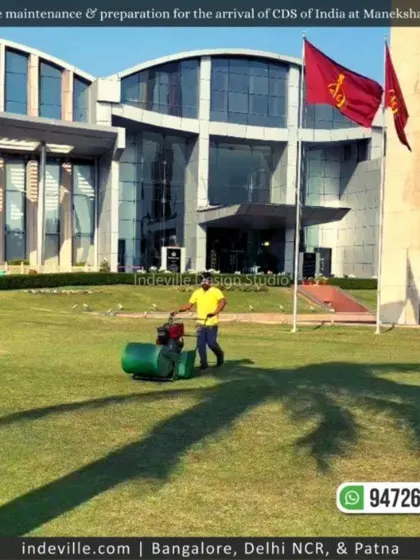 My staff member mowing the vast lawns of the Manekshaw Centre. Maintaining such large green spaces requires professional equipment and a dedicated team.