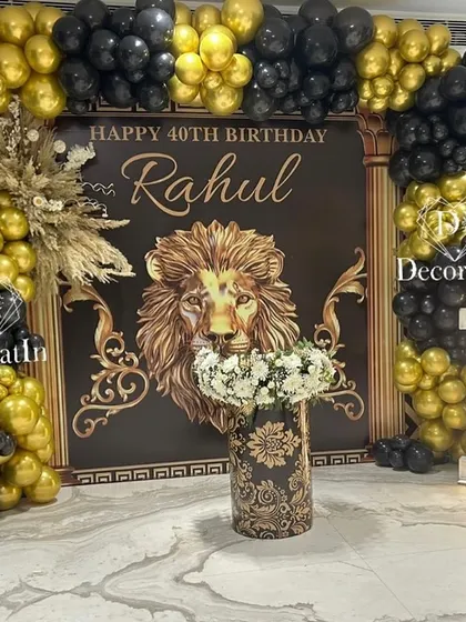 The complete black and gold setup for the 40th birthday, ready for photos and celebrations.