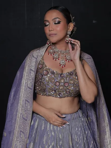 A serene shot of the model, highlighting the elegance of the jewellery.