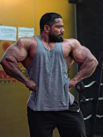A front lat spread, displaying the width of my upper body.