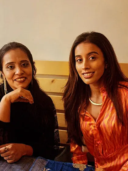 Connecting with guests at a Bumble India weekend event in Khar. These events are a wonderful opportunity to meet new people and offer a touch of spiritual guidance.