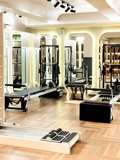 Welcome to your Pilates haven. This is where strength meets serenity, with our Swedish ladders and reformers waiting for your next session.