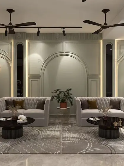 We design living rooms that are both grand and inviting. This space uses a soothing pastel green palette, neo-classical wall mouldings, and layered lighting to create an atmosphere of calm sophistication, perfect for both relaxing and entertaining.