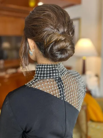 The back view of this beautiful twisted bun, showing the clean and intricate knot.