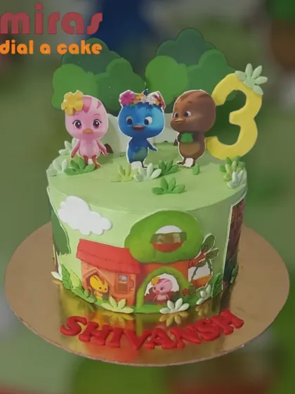 A charming cake based on the Katuri cartoon. This design features the little bird characters in a forest scene, complete with their house, making it a sweet surprise for a third birthday.