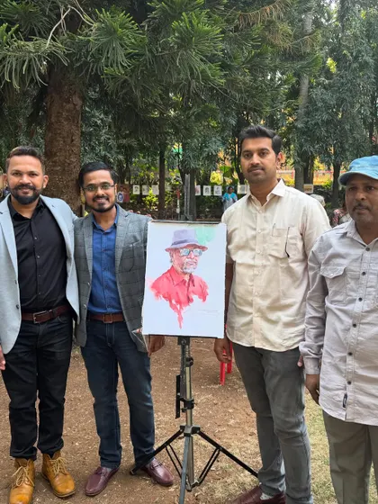 With the organizers and fellow artists at the Kalakari festival. These events are a great way to connect with the art community.