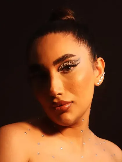 A full portrait of the conceptual rhinestone look. I scattered rhinestones on the collarbones to extend the jeweled effect from the eyes.