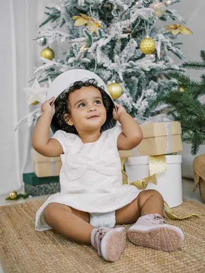 During my Christmas mini-sessions, the gifts were real photo albums. The surprise and joy on their faces were a gift to me.