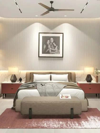 A serene and stylish master bedroom where comfort is key. The design includes a custom upholstered headboard, sleek bedside tables, and strategic lighting to create a relaxing and clutter-free personal retreat.