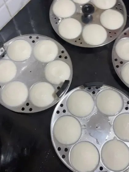 Freshly steamed idlis right out of the stand. I take pride in making these idlis incredibly soft and fluffy without using any cooking soda.