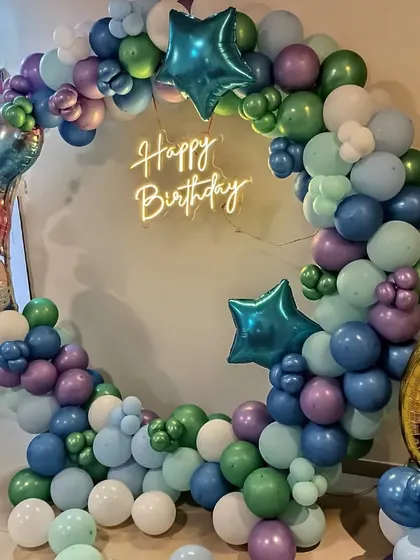 A side view of the mermaid balloon ring, showing the depth and texture of the balloon arrangement.