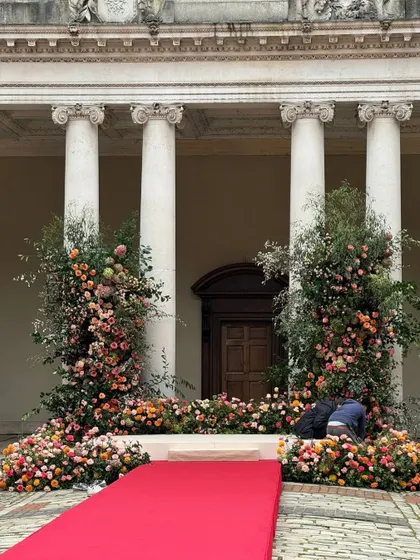 More glimpses of the English countryside celebration, showing the floral-draped entrance, the grand marquee tent, and the charming ice cream truck.