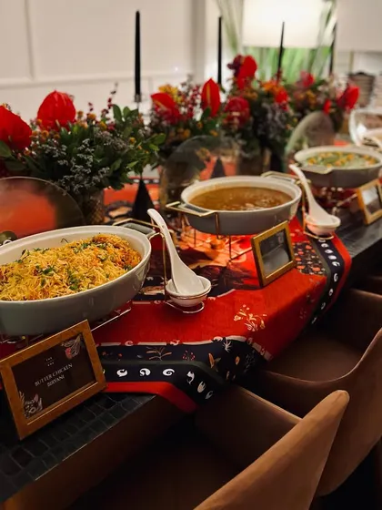 A buffet-style meal from one of our home catering experiences, showing a variety of dishes ready to be served.