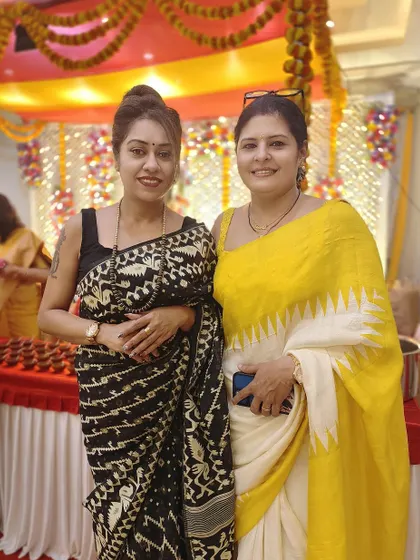 With a friend at the Kali Pooja celebration. It's always wonderful to see how different people interpret traditional festive wear.