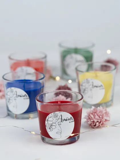 A simple yet beautiful display of my colorful shot glass candles. These are perfect for adding a pop of color and fragrance to any corner of your home.