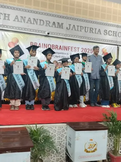 A group of our graduates on stage in their caps and gowns. This moment symbolizes their hard work, determination, and the bright future that lies ahead of them.