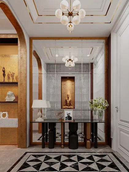 We designed this entrance foyer with hidden closets cleverly disguised as a decorative wall. The large mirror and elegant console table create a grand first impression, while the paneled walls conceal ample storage space.