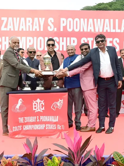 The Chairman, Mr. R. Manjunath Ramesh, presents the trophy for the Colts Championship Stakes to the owners of Sovereign King.