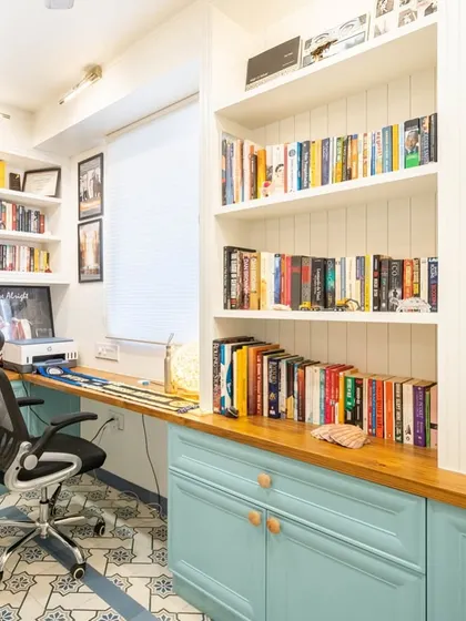 A wider view of the study room from image 31, showing the patterned floor tiles and organized layout.