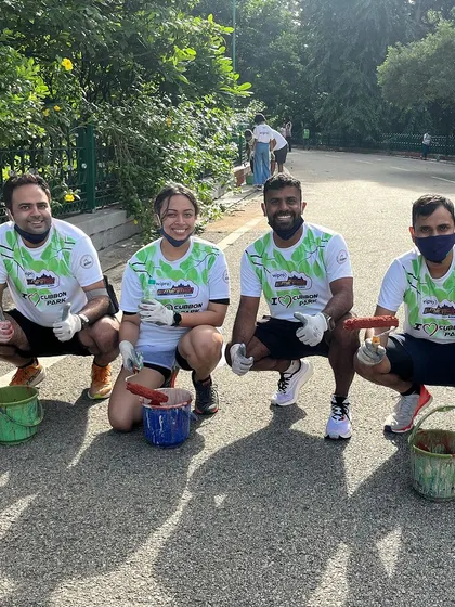 Let's paint it red. Our team getting their hands dirty to help paint the fences and curbs at Cubbon Park as part of a beautification drive.