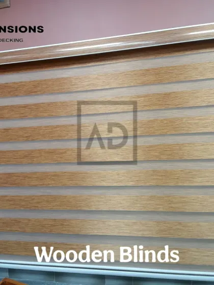 A close-up view of a wooden-style zebra blind. You can see the alternating sheer and solid panels that give you complete control over how much light enters the room, creating a modern, striped effect.