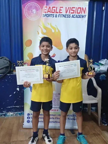 Twin brothers Rhys and Liam Pais with their trophies after competing against each other in the Boys Singles U13 final at the Eagle Vision Badminton Tournament.
