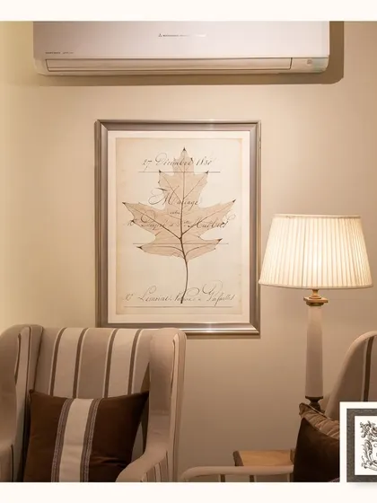 This "Autumn Maple Leaf" wall hanging brings a touch of nature's elegance indoors. The delicate details and script give it a vintage, botanical illustration feel, perfect for a cozy corner.
