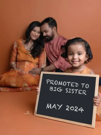 The best promotions are the ones in the family! This adorable "Promoted to Big Sister" announcement is a heartwarming way to include older siblings in your maternity photoshoot and celebrate your growing family.