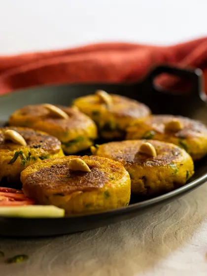 If you're looking for a delicious starter, my Badami Tikki is a perfect choice. It's a flavourful patty topped with a crunchy almond.