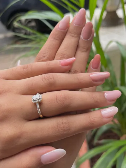 Showcasing the beauty of a multi-tonal manicure using only dip powders. This set features a sophisticated gradient of pink and nude shades, proving that simple can be stunning.