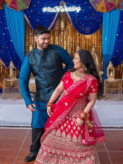 Another shot of the childhood sweethearts, their smiles telling a story of a love that's stood the test of time.
