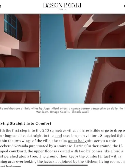 A screenshot from the Design Pataki feature, detailing how the Baia Villas' design invites visitors to dive straight into comfort. The calm water body sits within a U-shaped courtyard, creating an immediate sense of retreat.