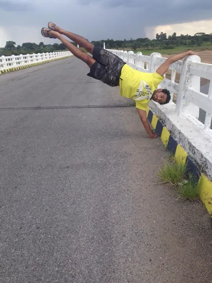 A human flag variation on a bridge. This move requires incredible oblique and shoulder strength.